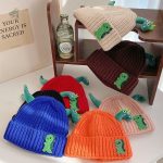 Bonnet dinosaure à écailles douces