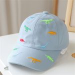 Look amusant avec cette casquette dinosaure