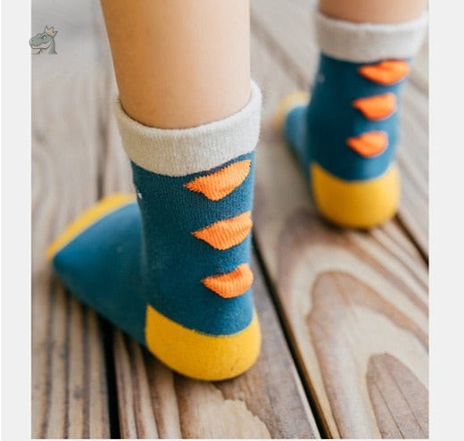 chaussette-anti-derapante-dinosaure-1 Chaussettes anti-dérapantes dinosaure pour enfants