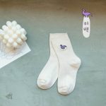Chaussettes fluo à thème dinosaure