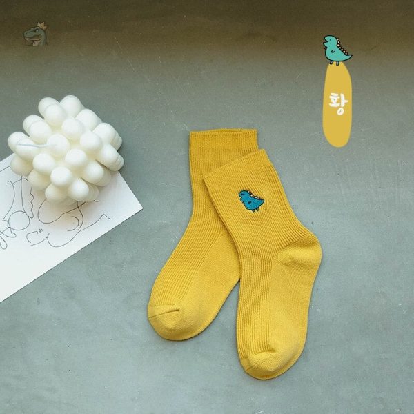 Chaussettes fluo avec impression de dinosaure