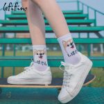 Chaussettes dinosaure pour une touche d'humour dans votre tenue