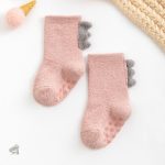Chaussettes pour enfants avec adorable motif de dinosaure