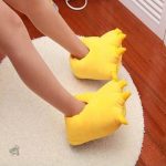 Chausson dinosaure en forme de patte de dino