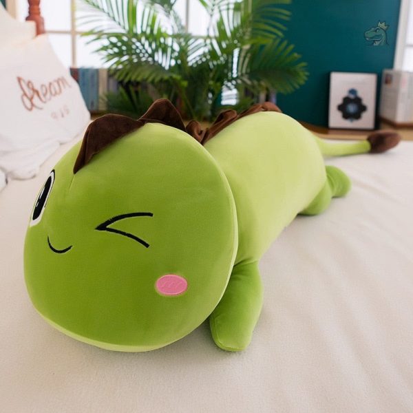 Coussin en forme de dinosaure pour stimuler l'imagination des enfants