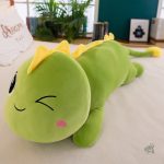 Coussin dinosaure pour une ambiance joyeuse et amusante