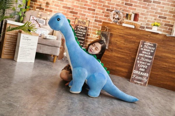 Doudou dinosaure bleu, parfait pour les moments de tendresse
