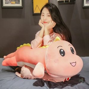 Grand coussin dinosaure peluche douce et colorée