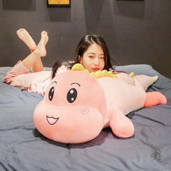 Coussin dinosaure en peluche, idéal pour les câlins
