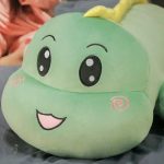 Peluche dinosaure en forme de gros coussin