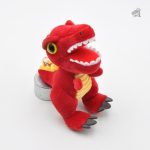 Détail de la peluche dinosaure porte-clé, design mignon et compact