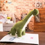 Peluche dinosaure beige et vert, modèle Diplodocus