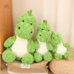 Peluche verte d'un dinosaure amusant