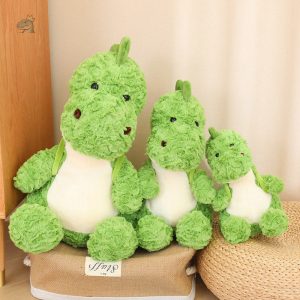 Peluche verte d'un dinosaure amusant