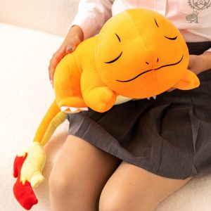 Peluche dinosaure, couleur orange, idéale pour les moments de jeu
