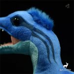 Peluche douce représentant un dinosaure