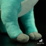 Doudou en forme de dinosaure vert pour les petits