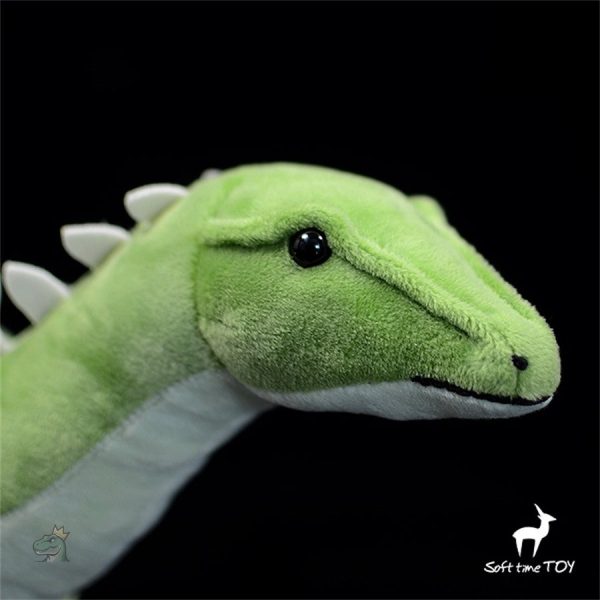 Peluche dino verte, idéale pour les câlins et les jeux