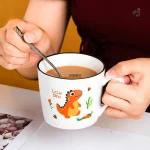 Tasse colorée à motif de dinosaure pour les fans de Jurassic