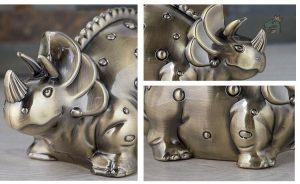 Économiseur en zinc dinosaure stylisé