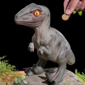 Tirelire dinosaure avec design réaliste et coloré