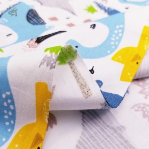 Tissu amusant dinosaure, parfait pour créations et décorations