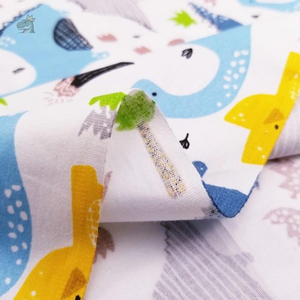 Tissu amusant dinosaure, parfait pour créations et décorations