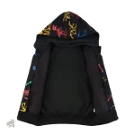 Veste amusante ornée de dinosaures
